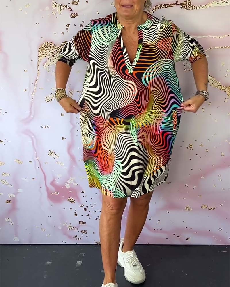 RIA | Colorful V-neck dress. 