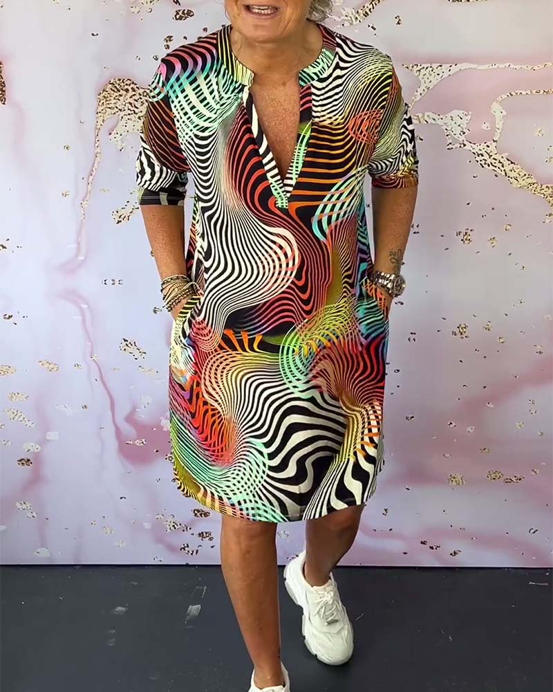 RIA | Colorful V-neck dress. 