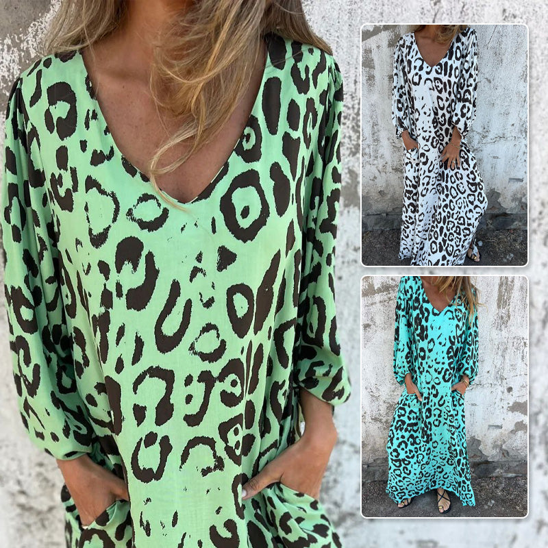 JOLY | Flowing dress with V-neck and pockets.